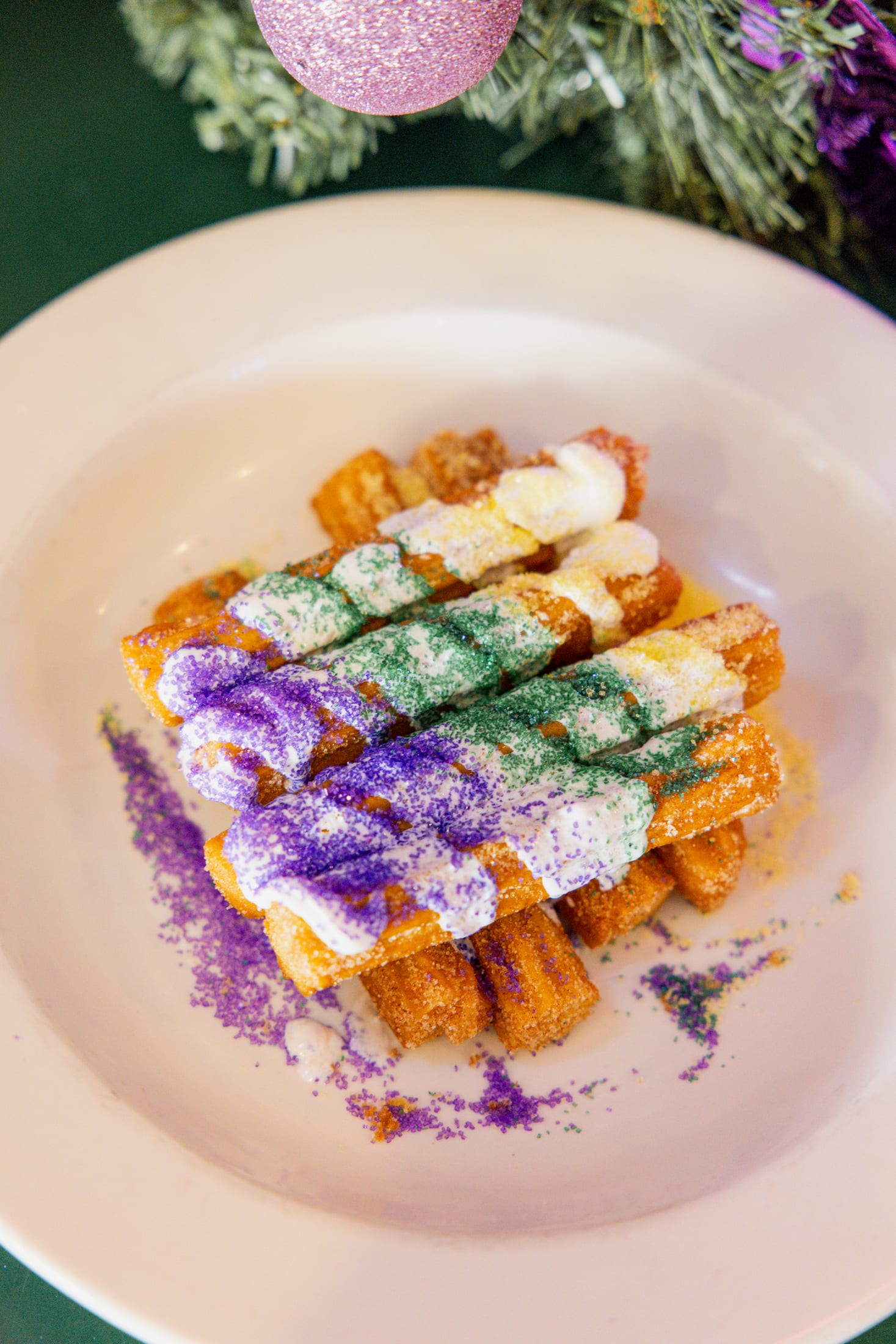 A plated king cake dessert from a local restaurant